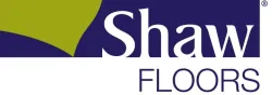 Shaw Floors logo featuring green and blue design elements with bold white text on a dark background.