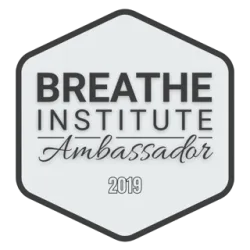 Hexagonal badge with Breathe Institute Ambassador 2019 text in black on light gray background
