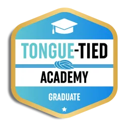 Badge showing Tongue-Tied Academy Graduate with a graduation cap and knot symbol in blue and gold colors