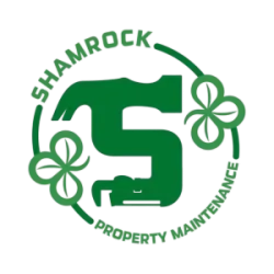 Green sewing machine inside a circular logo with shamrock leaves and the text Shamrock Embroidery & Alterations