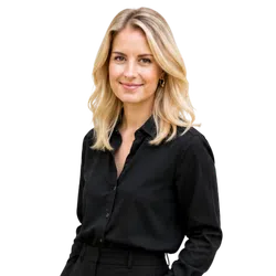 Portrait of a smiling blonde woman in a black button-up shirt with gold hoop earrings.