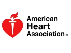 American Heart Association logo with red heart and white torch symbol on white background