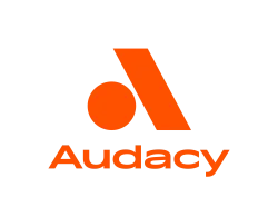 Audacy logo with an orange stylized A and dot on a black background.