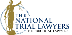 Logo of The National Trial Lawyers featuring Lady Justice holding scales inside a blue circle