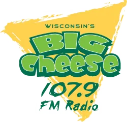 Logo for Wisconsin's Big Cheese 107.9 FM radio station with green text on a yellow cheese wedge background
