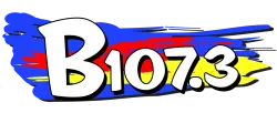 B 107.3 logo with bold white text and blue, red, and yellow brushstroke background.
