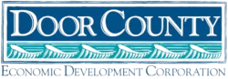 Logo of Door County Economic Development Corporation with waves and text in blue and teal colors.