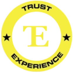 Yellow circular badge with black letter E in center, surrounded by words Trust and Experience with black stars