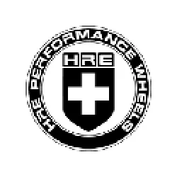 HRE Performance Wheels logo with a black shield and white cross inside a circular text frame.