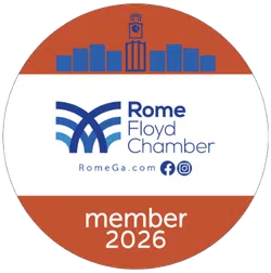Rome Floyd Chamber member badge for 2026 with logo and city skyline in orange and blue colors.