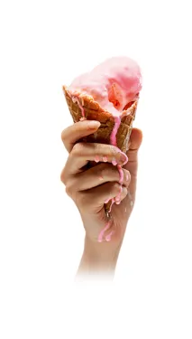 a woman holding a donut