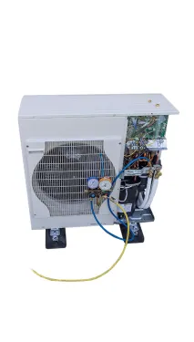 a white rectangular object with wires and a fan