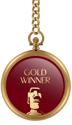 Gold pocket watch medal with chain and red face labeled Gold Winner with Easter Island Moai statue icon