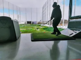 a person playing golf