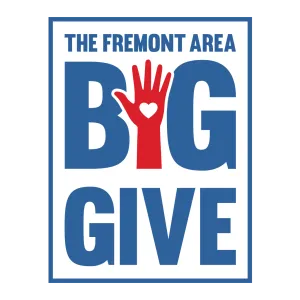 Logo for The Fremont Area Big Give featuring a red hand with a heart in the palm within bold blue text.