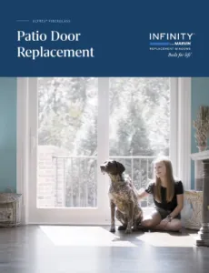 Young woman sitting on the floor petting her dog in front of white Infinity from Marvin sliding French doors.