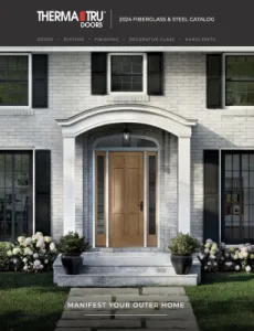 Therma-Tru Doors Brochure shows light brown wooden front door with sidelights on white 2 story brick home with black window shutters