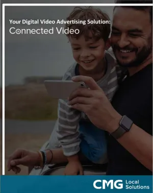 a man with a child looking at something on a phone