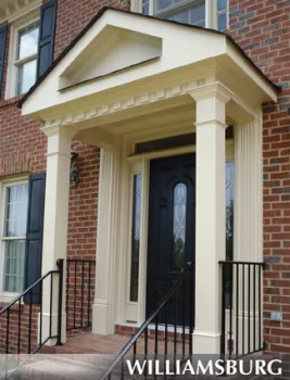 a brick building with a black door