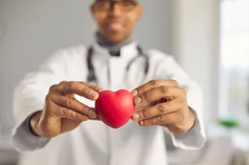 a person holding an object in his hand