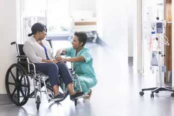 a man and a woman sitting on a chair
