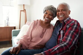 a man and a woman sitting on a couch