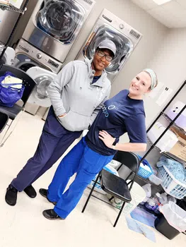 maidpro baton rouge cleaning pros working on laundry services