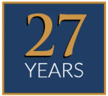 Blue square with gold border displaying the number 27 in gold and the word YEARS in white beneath it