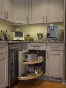 a kitchen filled with appliances and cabinets