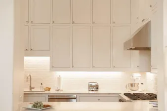 a kitchen with a dining table