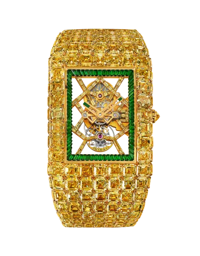 a gold and green rectangular object with a design on it