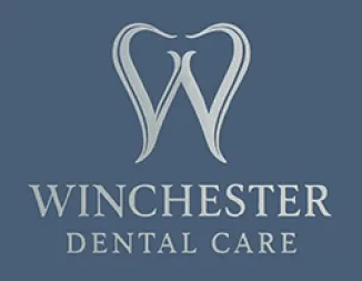 Winchester Dental Care logo with stylized W and gray text on blue background