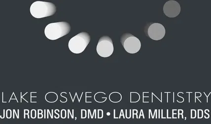 Lake Oswego Dentistry logo with stylized white semicircle and dentist names on dark background