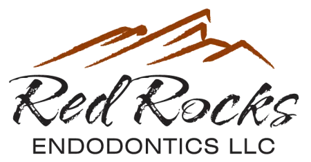Logo of Red Rocks Endodontics LLC featuring stylized mountain peaks and company name.