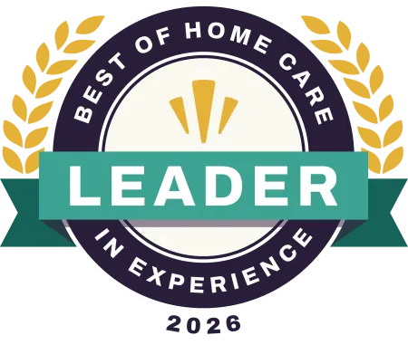 Badge showing 'Best of Home Care Leader in Experience 2026' with laurel wreaths and teal ribbon.