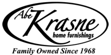 Black and white logo featuring the word Krasne in cursive inside an oval shape