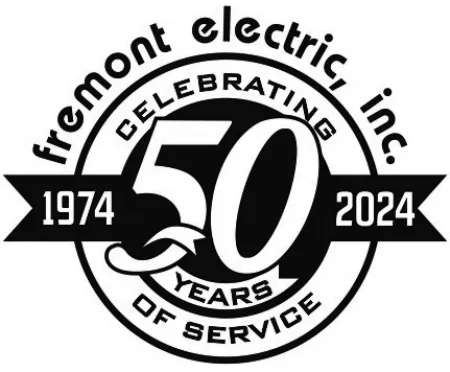 Fremont Electric Inc. logo celebrating 50 years of service from 1974 to 2024 in black and white design.