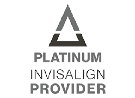 Platinum Invisalign Provider logo featuring a gray triangular symbol above bold text on black background