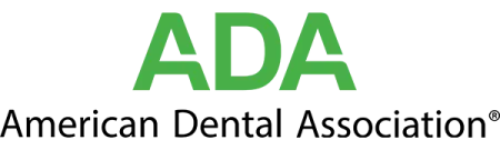 Green ADA logo text on a transparent background representing the American Dental Association.