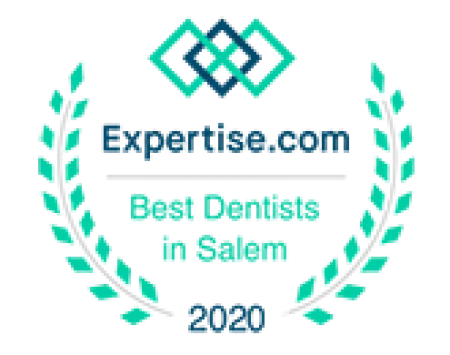 Expertise.com award badge for Best Dentists in Salem 2020 with laurel wreath and geometric logo.