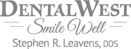 DentalWest Smile Well logo featuring Stephen R. Leavens, DDS in gray text with decorative lines.