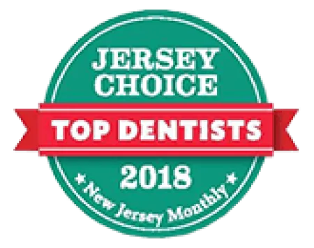 Jersey Choice Top Dentists 2018 award badge by New Jersey Monthly in green and red.