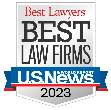 2023 Best Law Firms badge by Best Lawyers and U.S. News & World Report with red, black, blue, and white colors