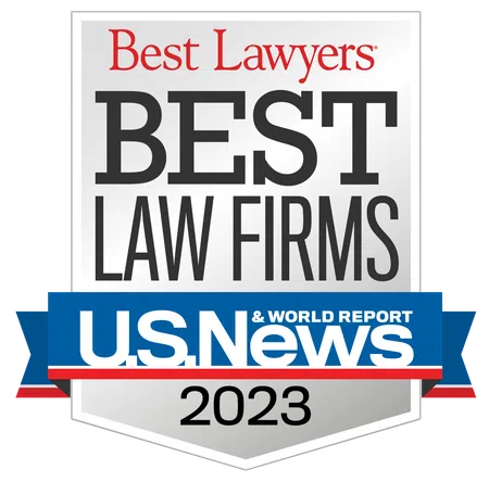 Best Lawyers and U.S. News 2023 Best Law Firms award badge with ribbon design