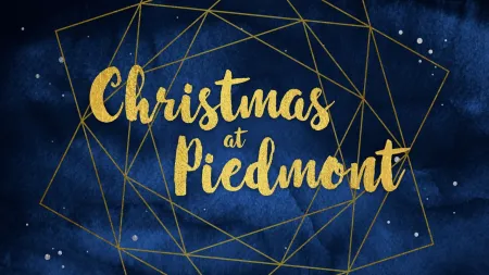 Gold text Christmas at Piedmont on dark blue background with gold geometric star design and white speckles.