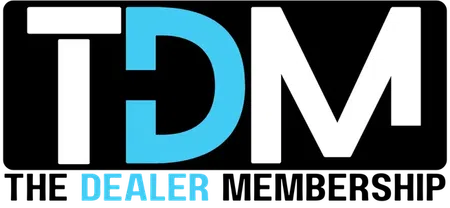 TDM Dealer logo with bold white and blue letters on black background.