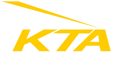 Yellow KTA text with a white shining starbeam on a black background