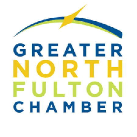 Logo of Greater North Fulton Chamber with blue, yellow, and green text and a star and arc design above.