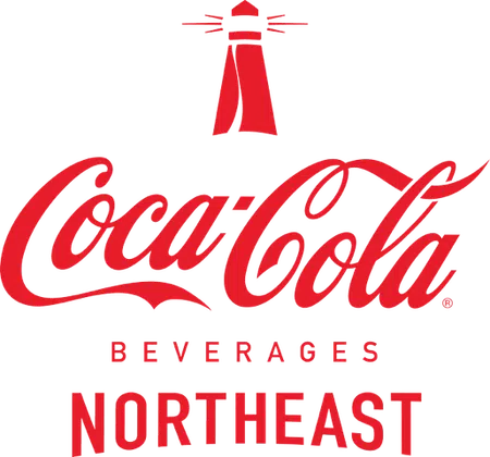 Coca-Cola Beverages Northeast logo with red script text and a red lighthouse icon above the brand name.