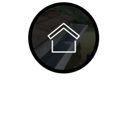 Close-up of a roof gutter system collecting water next to asphalt shingles under a house icon.